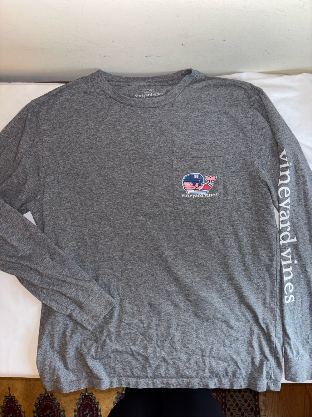 Vineyard Vines long-sleeve pocket t-shirt with a hockey whale logo